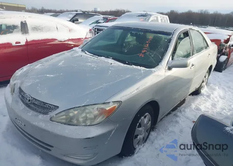 2002 Toyota Camry Le z USA, uszkodzony, nr VIN 4T1BE32K72U613797